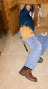 garbage disposal repair under a sink in Gaithersburg, Maryland